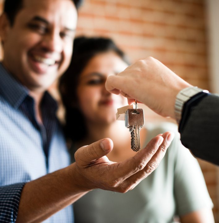 Prospective properties consumers in Boise ID discussing new home options with a Keller Williams Realty agent.