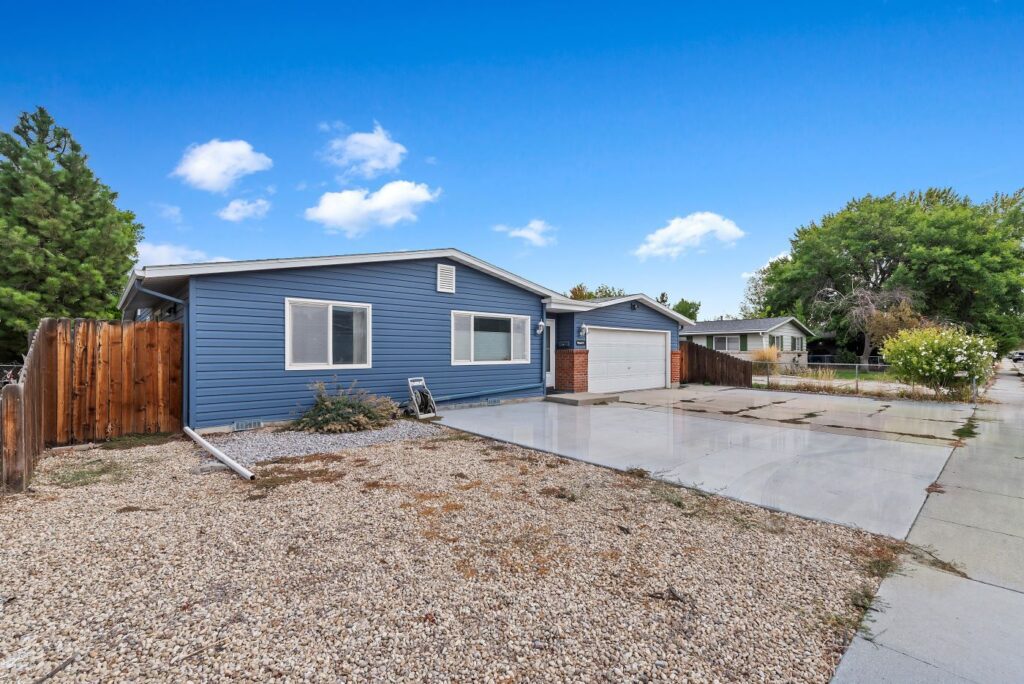 Spacious 4-bedroom Boise home near Vista Avenue with long-term investment potential and oversized garage.